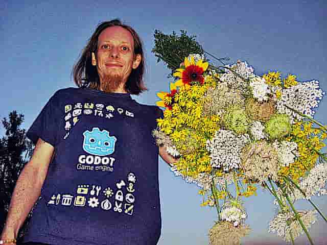 Krzysztof Krystian Jankowski in a Godot t-shirt